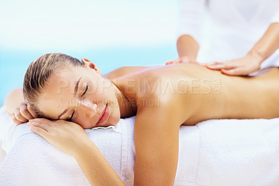 Buy stock photo Woman, relax and massage for back with spa therapist for wellness, holistic therapy or cosmetic care at holiday resort. Beauty salon, skincare and or calm client rest for treatment, peace or vacation