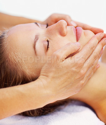 Buy stock photo Woman, relax and face massage with spa therapist for wellness, holistic therapy and reiki in studio on white background. Beauty, skincare and or client rest for facial acupressure, treatment or peace