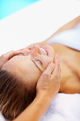 Buy stock photo Woman, spa and face massage with therapist for wellness, holistic therapy and reiki at holiday resort. Beauty, skincare and happy client for facial acupressure, zen treatment and relax on vacation 