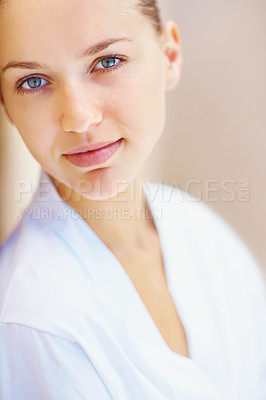 Buy stock photo Portrait, beauty and happy with a young woman on a wall background for wellness or natural treatment. Face, skincare and aesthetic with a person at the spa or salon for dermatology or self care