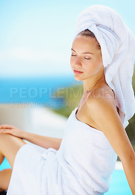 Buy stock photo Relax, woman and spa resort outdoor with wellness, skincare and health treatment with blue sky. Hotel pool, rest and zen of a calm female person on vacation with body care and ready for massage