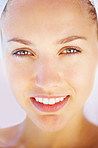 Cute female smiling at a spa treatment , closeup