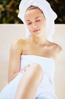 Buy stock photo Relax, body and woman with towel for spa, self care or shaving treatment for hygiene. Beauty, clean and calm young female person from Canada with health and wellness routine at a natural salon.