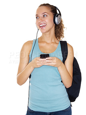 Buy stock photo Happy female college student with an music player isolated against white background