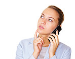 Business woman talking on cellphone looking away in thought