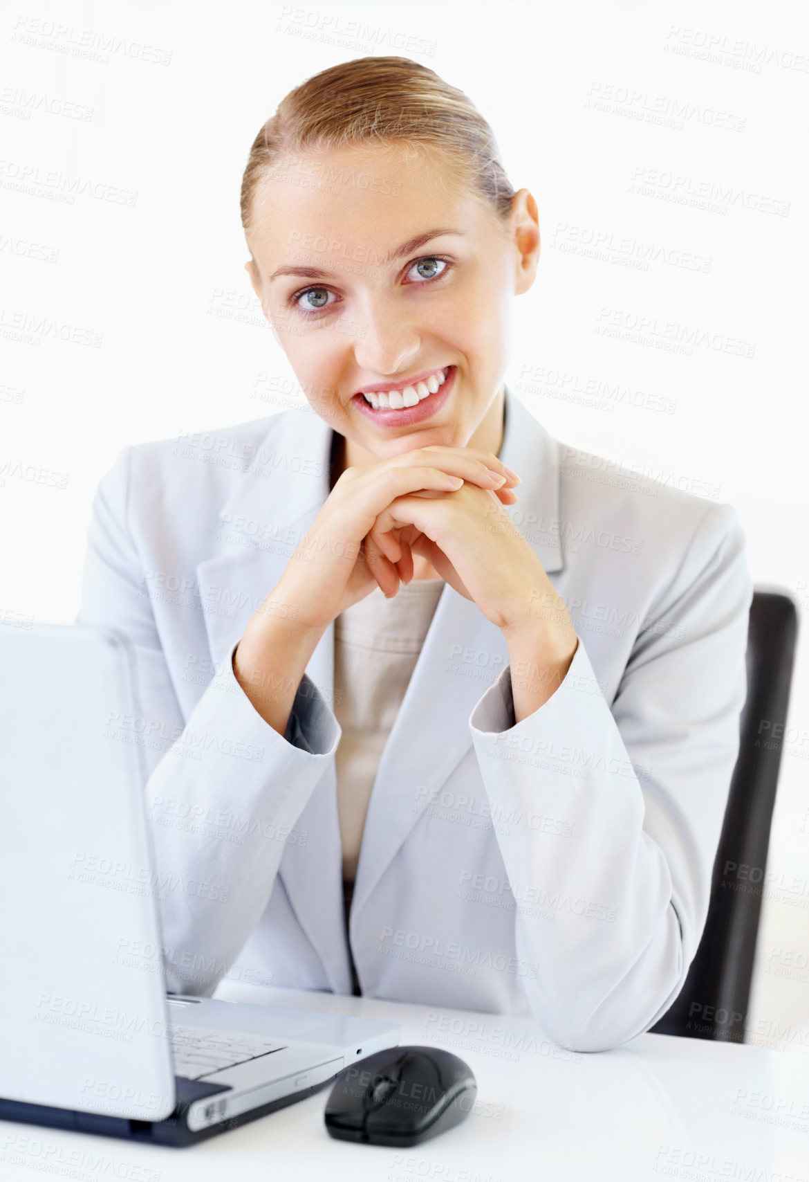 Buy stock photo Pretty young business woman sitting in front of a laptop with a smile at work