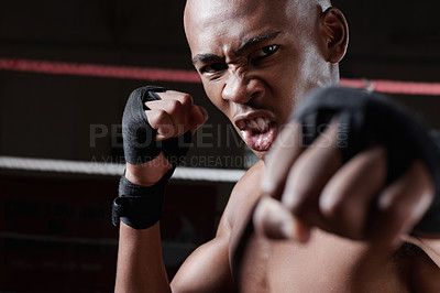 Buy stock photo Portrait of muscular African American male boxer in action