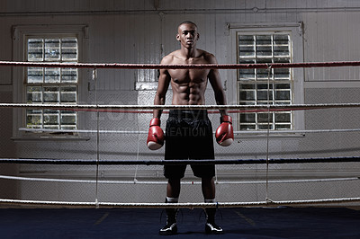 Buy stock photo Full length of muscular African American male boxer standing in ring