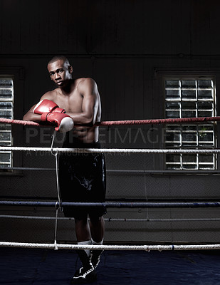Buy stock photo Full length of handsome African American male boxer standing near ring