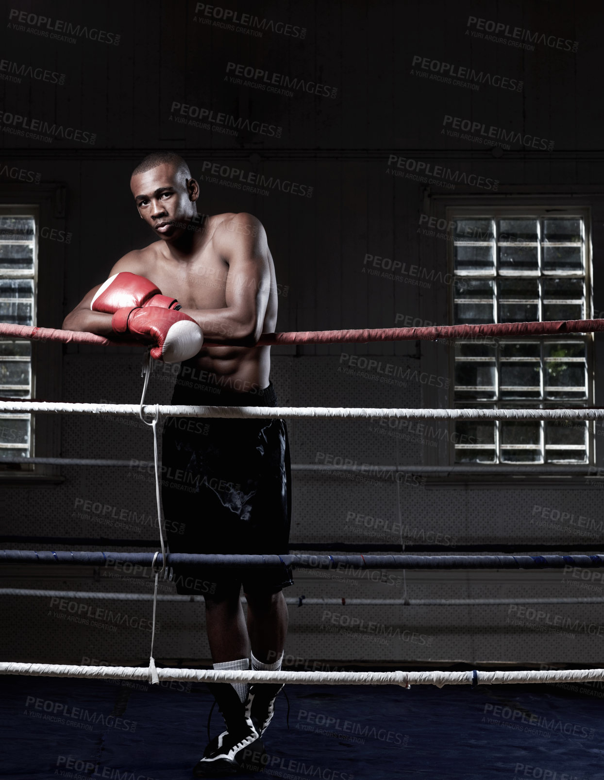 Buy stock photo Full length of handsome African American male boxer standing near ring