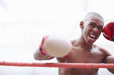 Buy stock photo Aggressive African American male athletic ready to punch