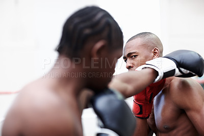 Buy stock photo Two African American male athletics boxing in ring