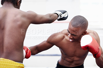 Buy stock photo Two African American muscular men fighting in ring