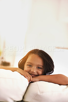 Buy stock photo Happy, morning and portrait of child on sofa for playful, fun and resting on weekend in living room. Smile, childhood and face of young girl alone on couch for relaxing, holiday and comfort in home