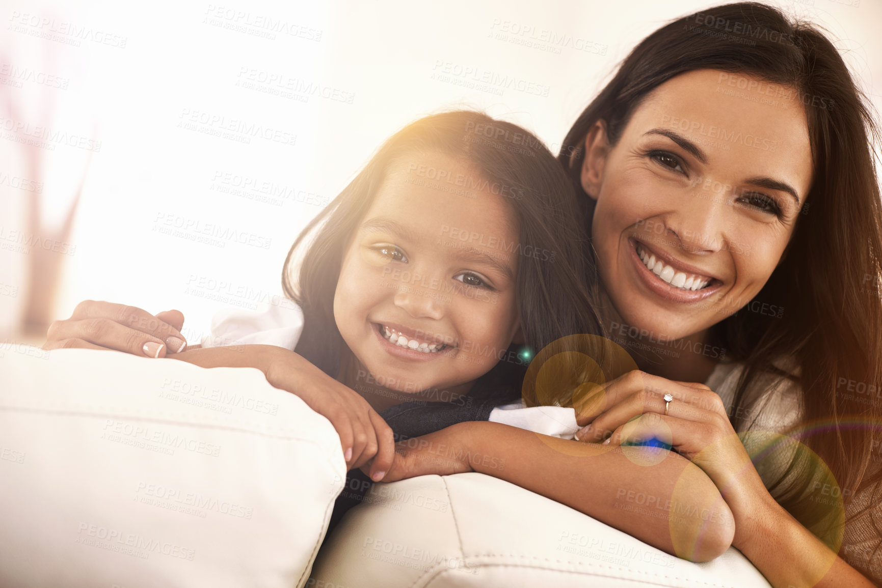 Buy stock photo Cropped portrait of a happy mother and daughter at home