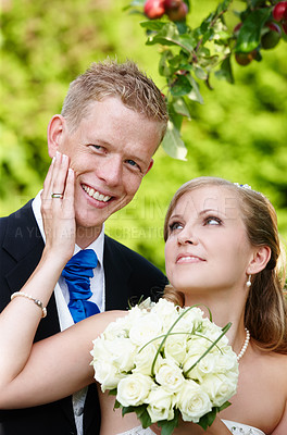 Buy stock photo Cropped shot of a bride and groom on their wedding day