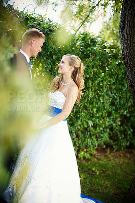 Buy stock photo Shot of a bride and groom on their wedding day