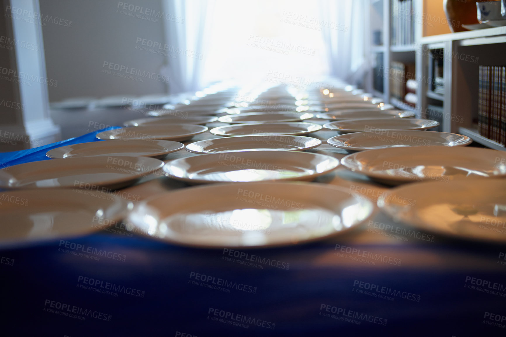 Buy stock photo Shot of plates arranged on a table at a wedding reception