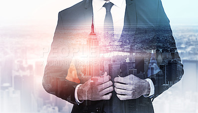 Buy stock photo Shot of an unrecognizable businessman superimposed over a cityscape