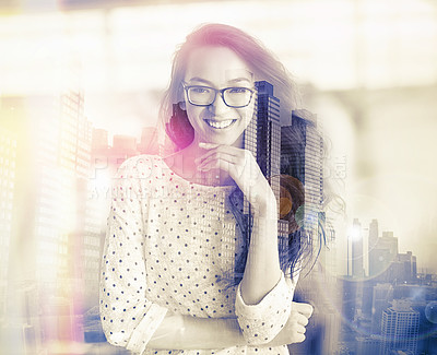 Buy stock photo Portrait of an attractive young woman superimposed over a cityscape