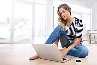 Buy stock photo Woman, home and freelancer typing on laptop, searching and weekend break with copywriter. Living room, internet browse and report for remote work, connection and apartment or online website in lounge