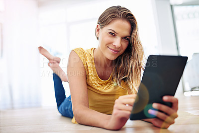 Buy stock photo Girl, portrait and tablet on floor in living room for online shopping, e commerce and internet browsing. Woman, technology and streaming on ground in home for ebook subscription, social media and app