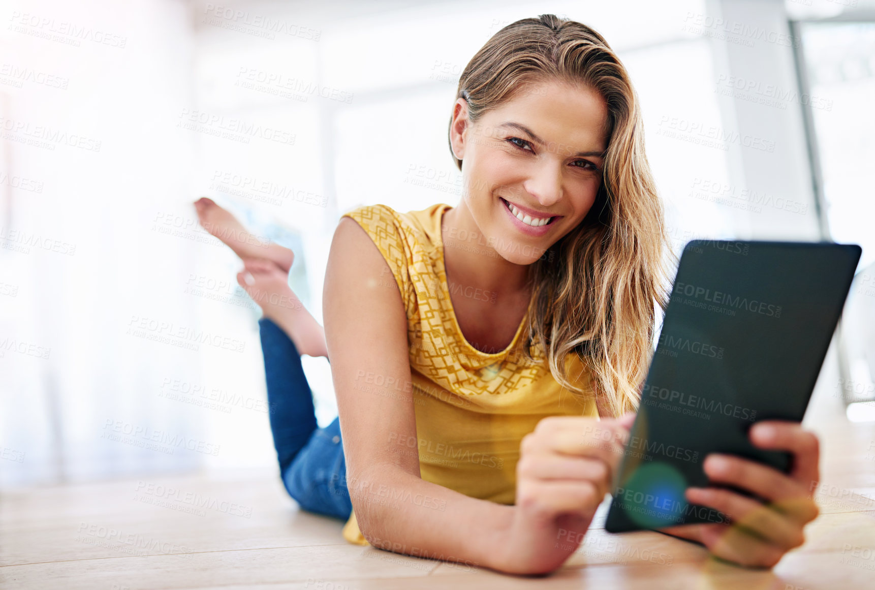 Buy stock photo Girl, portrait and tablet on ground in living room for online shopping, e commerce and internet browsing. Woman, technology and streaming on floor in home for ebook subscription, social media and app