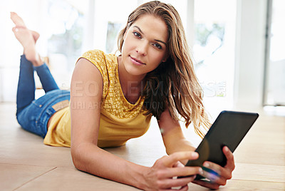 Buy stock photo House, portrait and woman on floor with tablet, streaming subscription, choose movies and films. Apartment, female person and digital for website, networking and chatting on social media in home