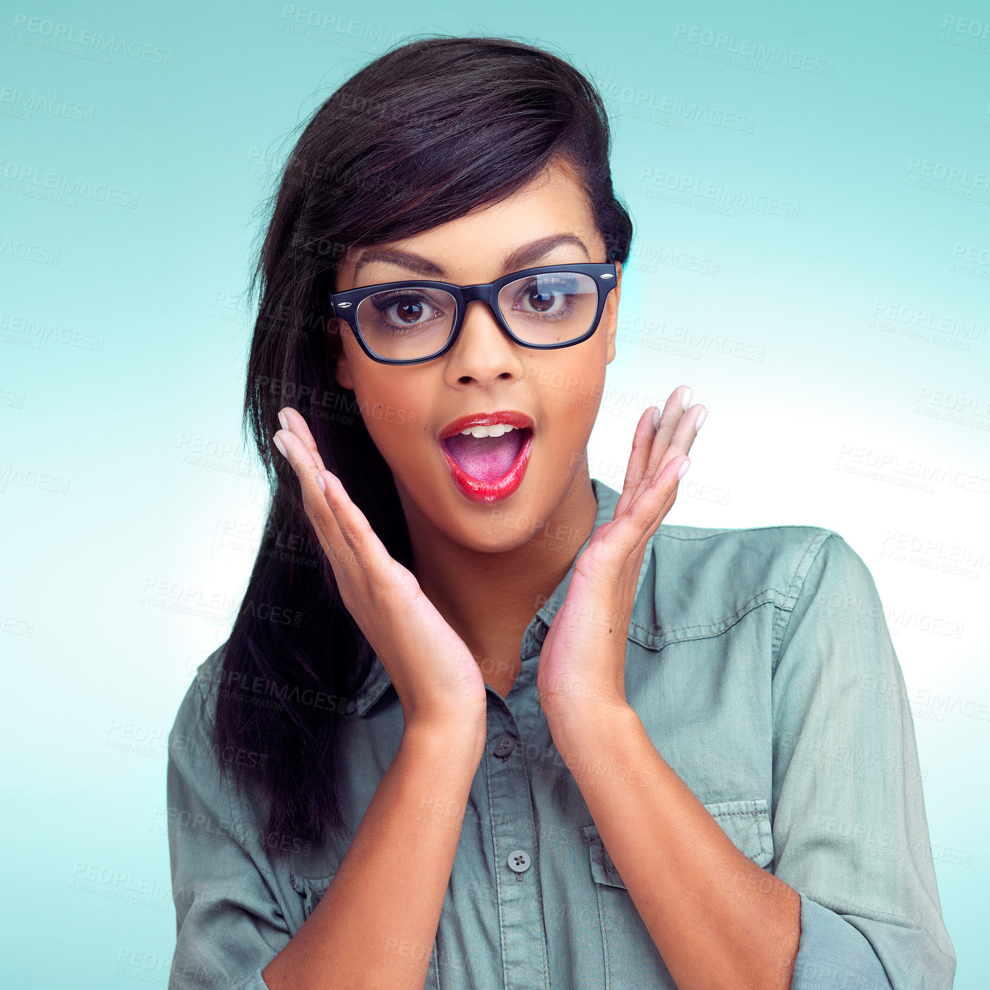 Buy stock photo Cropped shot of a fashionable young woman posing in a studio