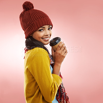 Buy stock photo Winter, coffee and portrait of woman in studio with smile for drink, caffeine or start to morning. Happy, female person and warm beverage with pride for comfort, break or wellness on red background