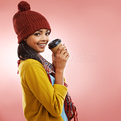 Buy stock photo Portrait, drinking coffee and happy woman in scarf for fashion in studio isolated on a red background mockup space. Face, smile and model in beanie, casual clothes and student with latte in Brazil