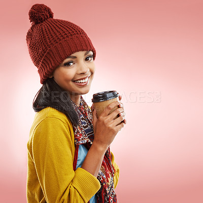 Buy stock photo Winter fashion, student and smile in portrait with coffee, warmth and comfortable on pink background. Woman, happy and cozy in studio for cold season, wellbeing and casual wear for outgoing