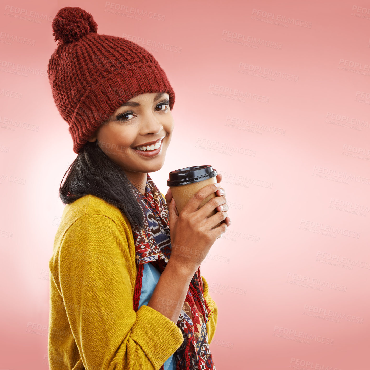 Buy stock photo Winter fashion, student and smile in portrait with coffee, warmth and comfortable on pink background. Woman, happy and cozy in studio for cold season, wellbeing and casual wear for outgoing