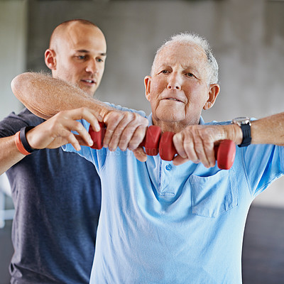 Buy stock photo Physiotherapist man, senior patient and weight training for health and wellness therapy in retirement. Healthcare, physio and workout for recovery with a dumbbell for medical care and elderly person