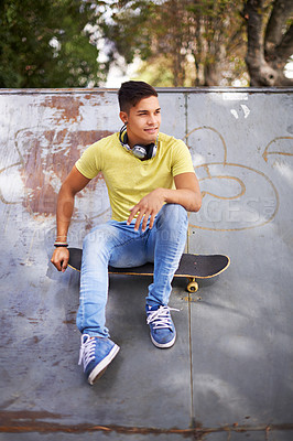 Buy stock photo Fashion, thinking and man with skateboard in skate park for exercise, training and skating in city. Skater, fitness and person in trendy, casual and street style for sports, fun hobby and relax