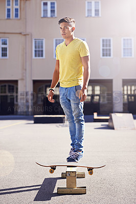 Buy stock photo Man, skateboard and balance at urban skatepark, sports and skill with beam or ramp for recreation activity outdoor. Skateboarder, technique and trick, training and workout for riding and exercise