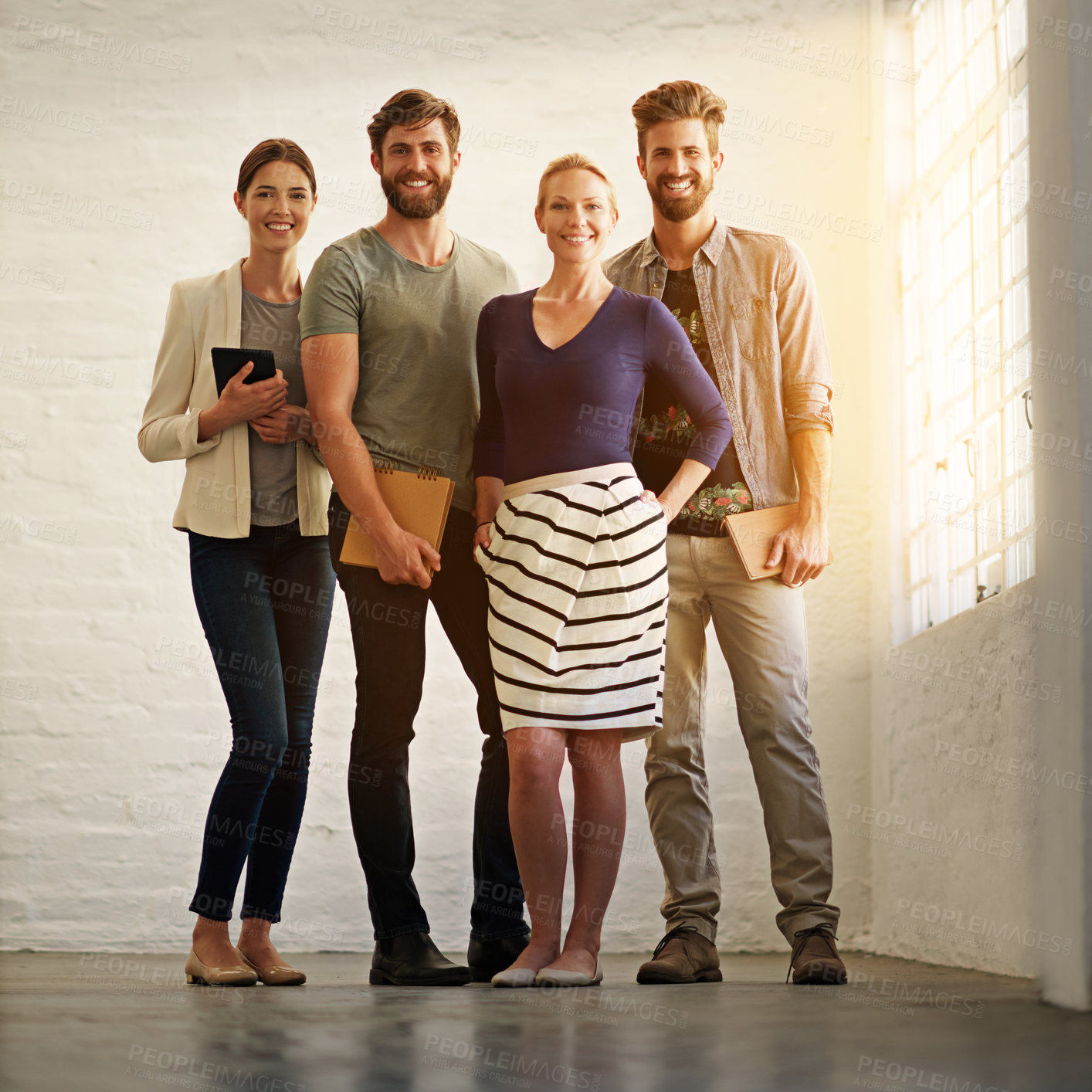 Buy stock photo Full length portrait of a business team standing in their office