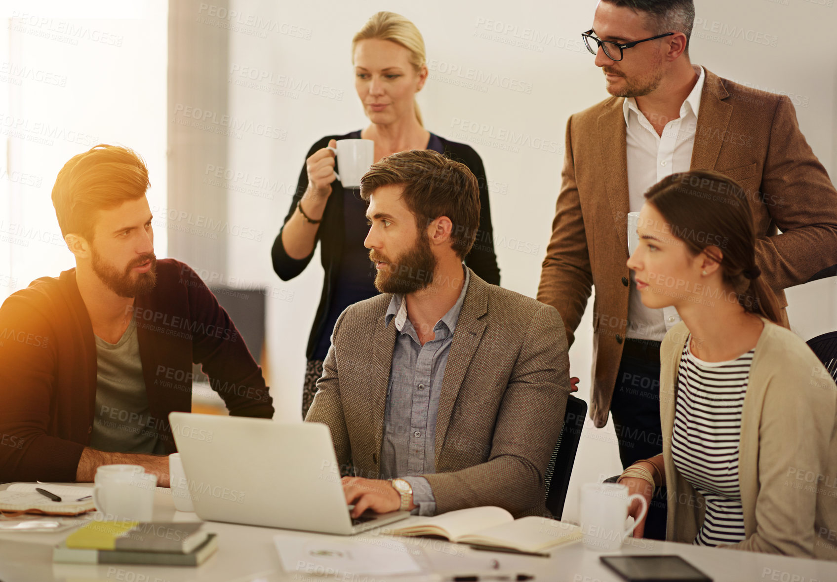 Buy stock photo Cropped shot of a group of businesspeople in the boardroom