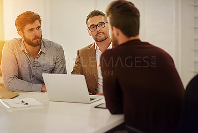 Buy stock photo Cropped shot of three businessmen in the boardroom