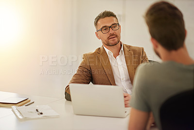 Buy stock photo Cropped shot of two businessmen in the boardroom