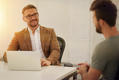 Buy stock photo Cropped shot of two businessmen in the boardroom