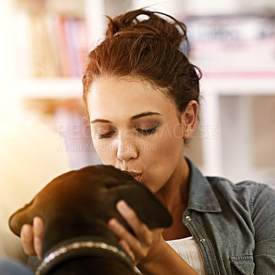 Buy stock photo Dog, woman and kiss for animal, pet and cuddle together indoor for bonding, affection and friendship. Puppy, lady or owner for care, love and scratch for adorable, cute and companion for family

