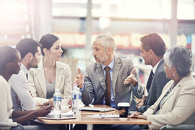 Buy stock photo Shot of a group of diverse businesspeople in a meeting