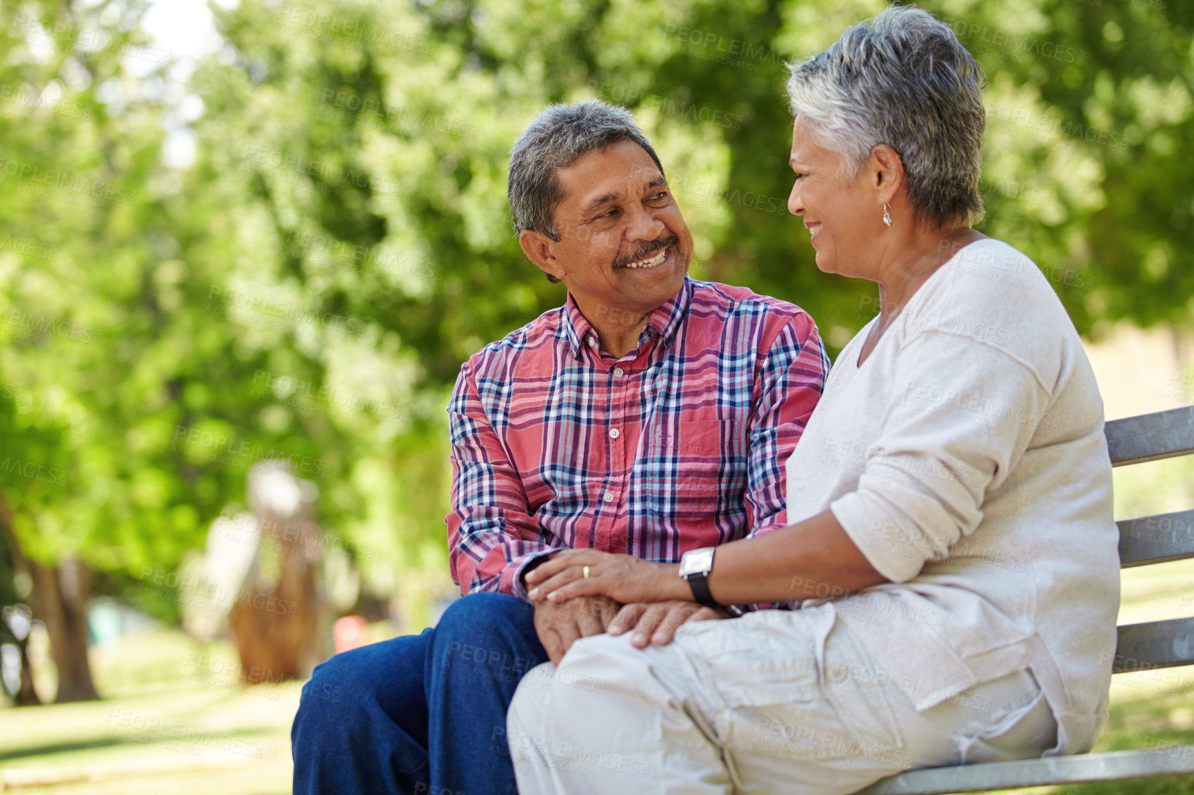 Buy stock photo Shot of a loving senior couple enjoying quality time together outdoors