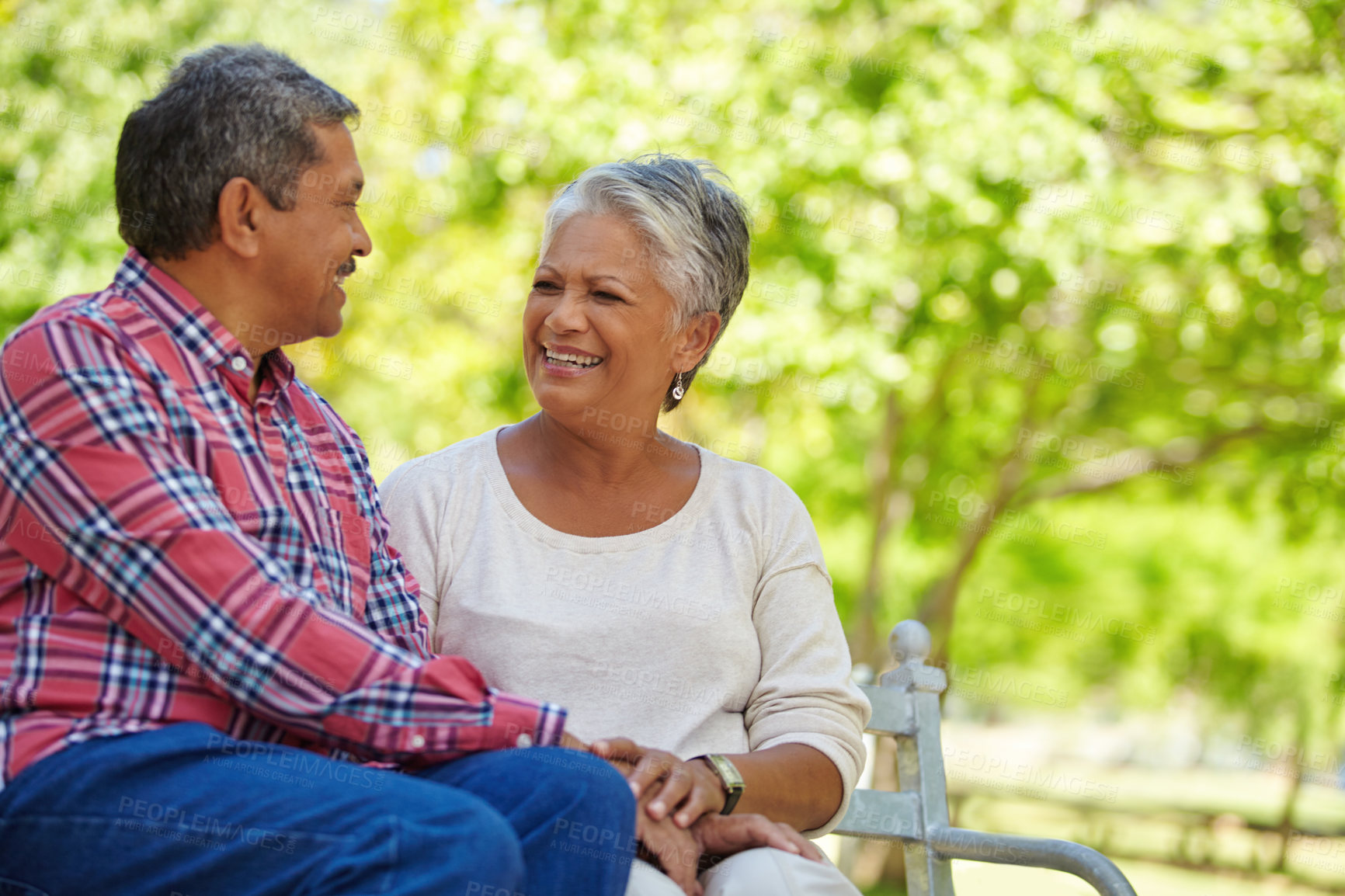 Buy stock photo Shot of a loving senior couple enjoying quality time together outdoors