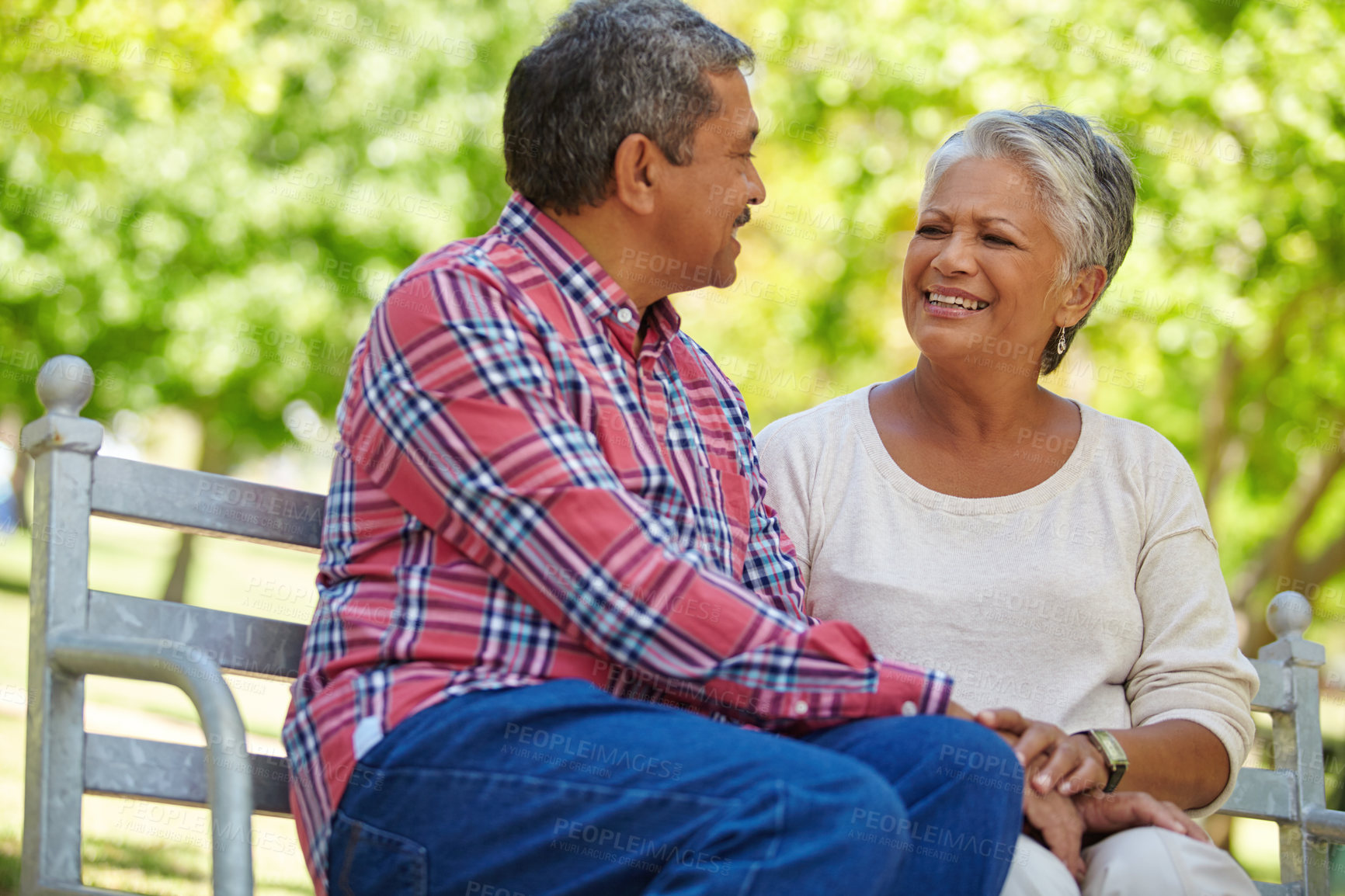 Buy stock photo Shot of a loving senior couple enjoying quality time together outdoors