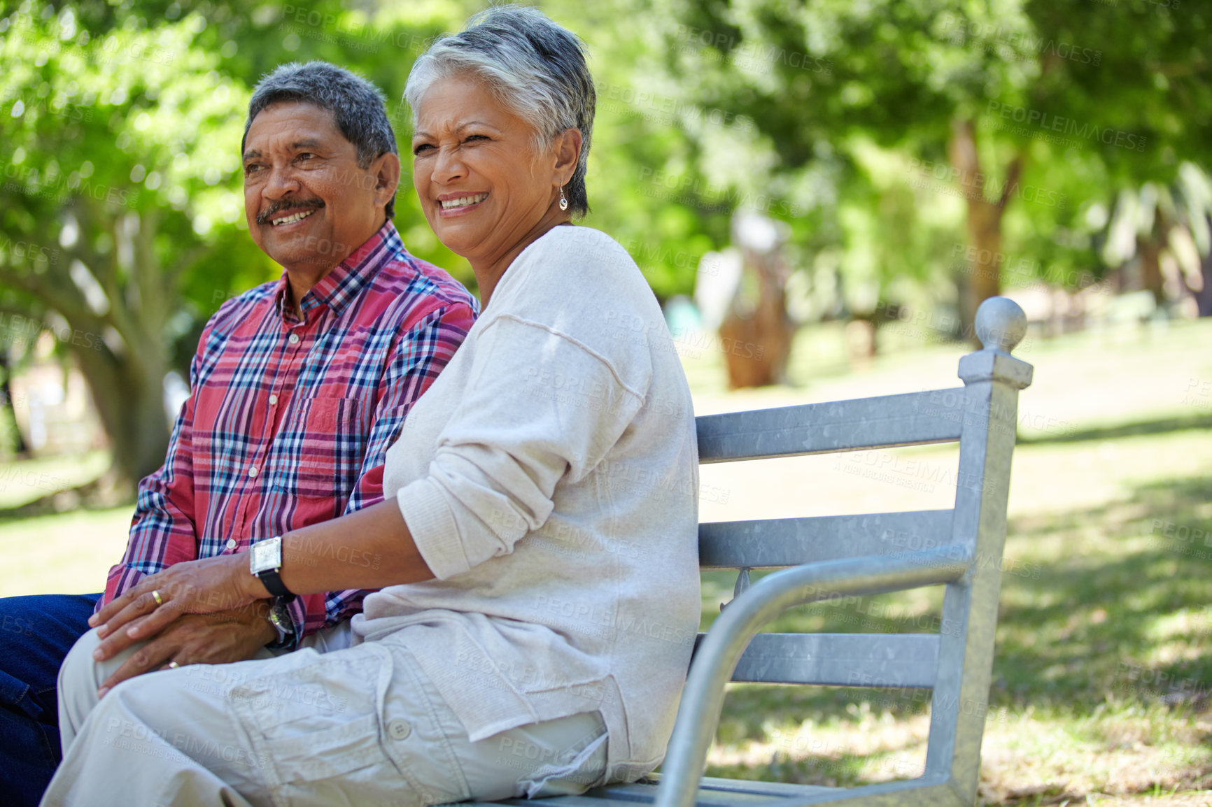 Buy stock photo Shot of a loving senior couple enjoying quality time together outdoors