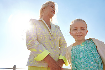 Buy stock photo Shot of a grandmother and her granddaughter spending some time outdoors