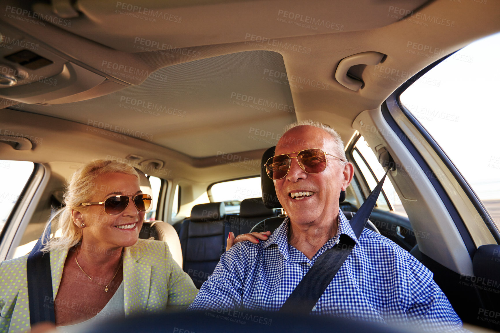 Buy stock photo Shot of a senior couple on a road trip