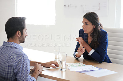 Buy stock photo Shot of a businesswoman interviewing a job applicant in an office